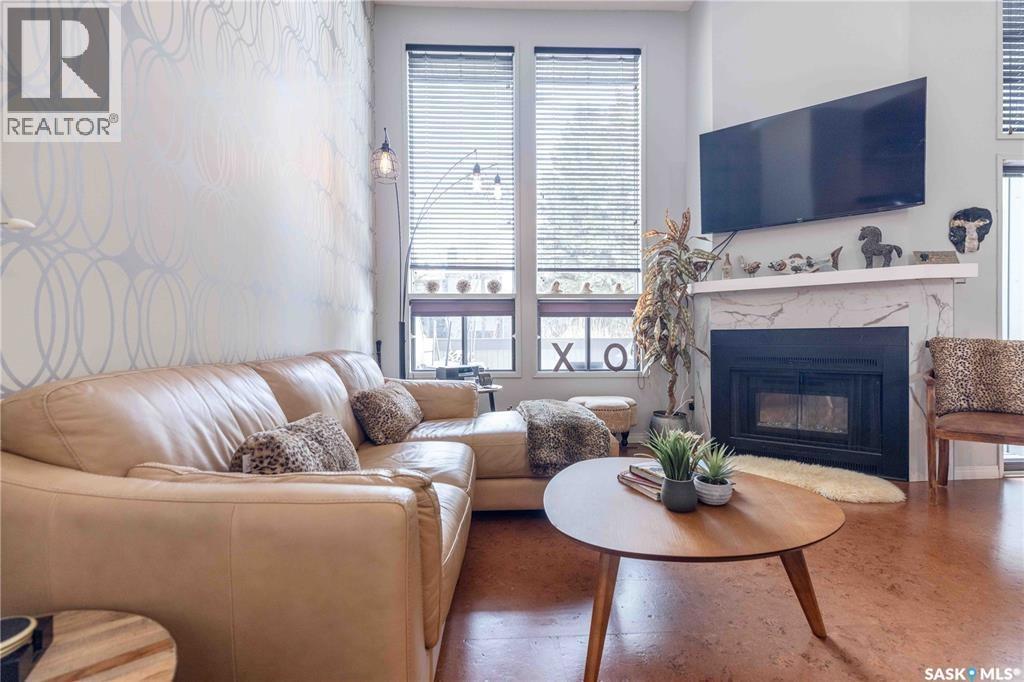 52 455 Pinehouse Drive, Saskatoon, SK - Indoor Photo Showing Living Room With Fireplace