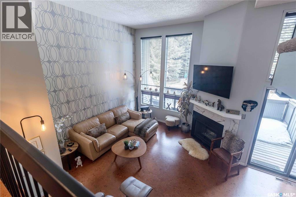 52 455 Pinehouse Drive, Saskatoon, SK - Indoor Photo Showing Living Room With Fireplace
