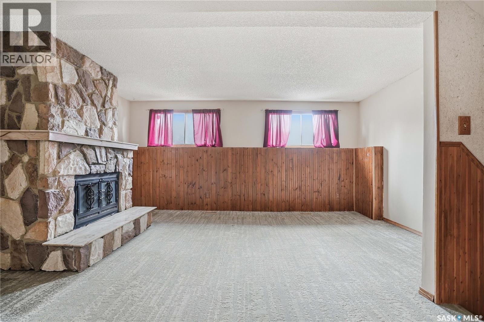 3 Carson Road, Regina, SK - Indoor With Fireplace