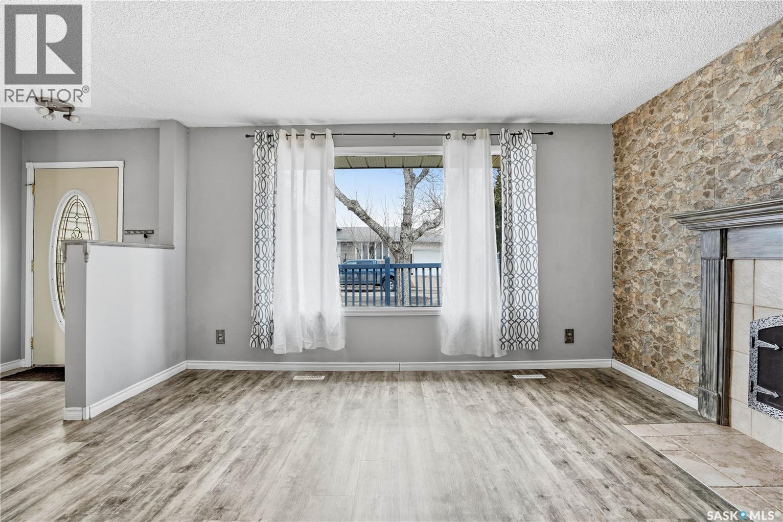 3 Carson Road, Regina, SK - Indoor With Fireplace