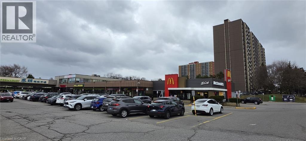 View of uncovered parking lot - 3305 Sheppard Avenue E, Toronto, ON