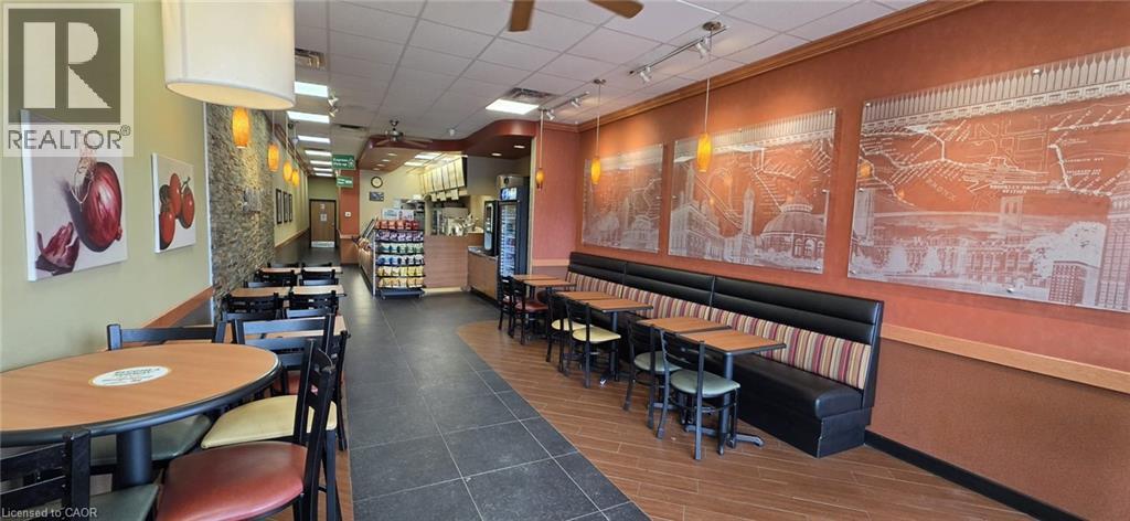 Community lobby featuring rail lighting and a paneled ceiling - 3305 Sheppard Avenue E, Toronto, ON