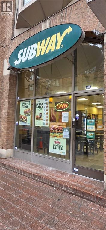 Entrance to property featuring brick siding - 132 Front Street E Unit# #1-B, Toronto, ON
