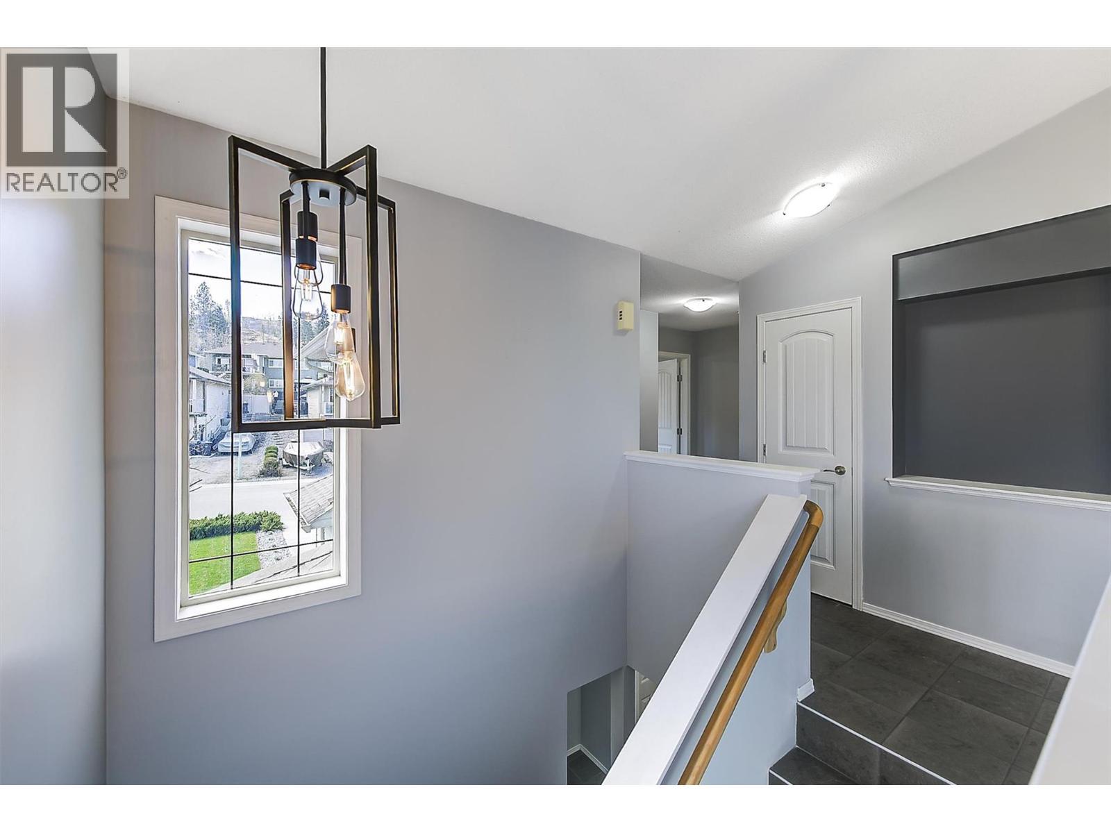 Stairwell to lower level - 546 South Crest Drive Lot# 1, Kelowna, BC - Indoor Photo Showing Other Room