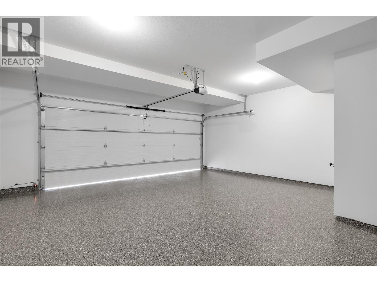 Garage. Photos may be of a similar home in the community. - 1455 Cara Glen Court Unit# 135, Kelowna, BC - Indoor Photo Showing Garage