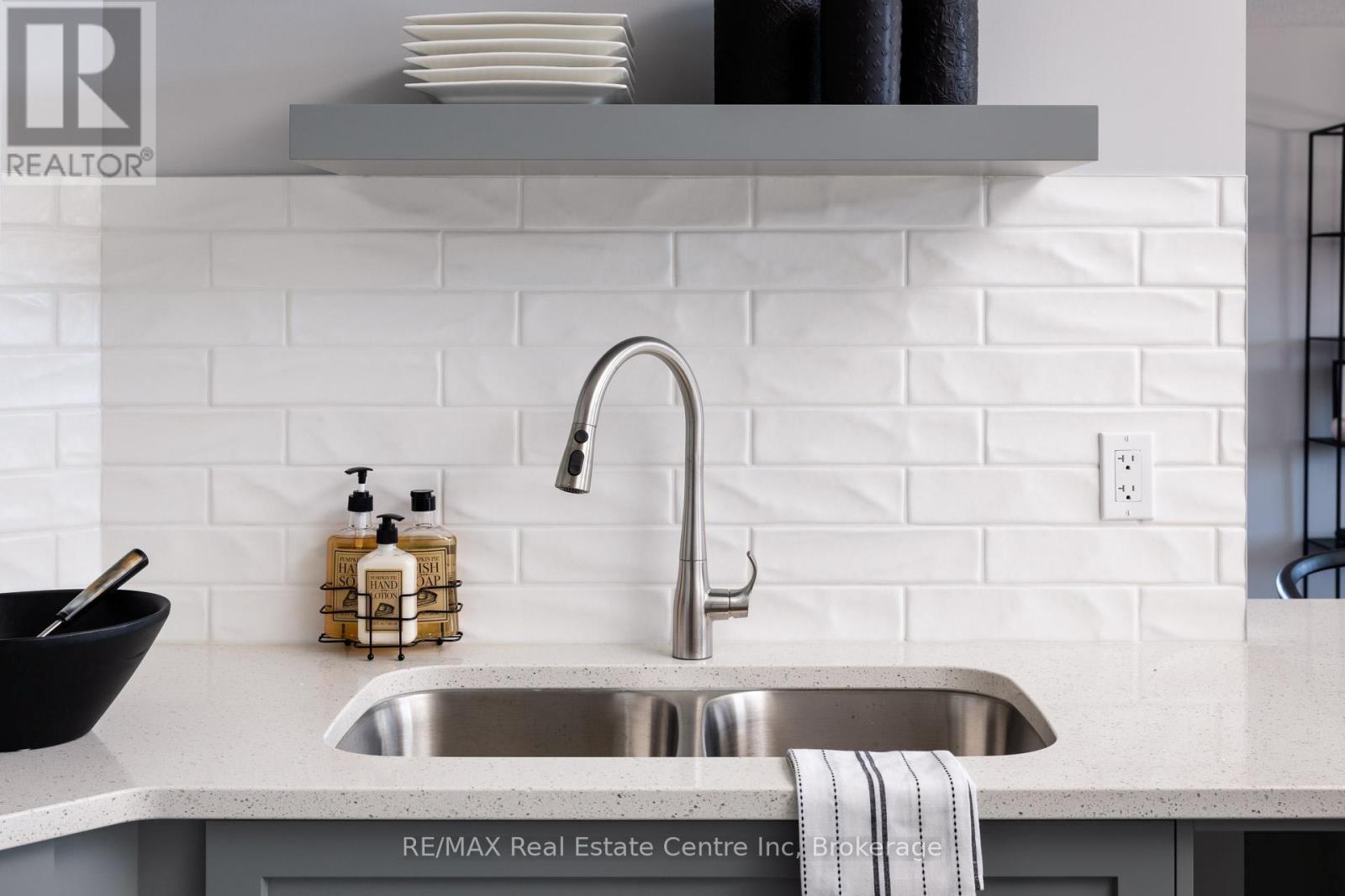 Photo is representation of Builders work - 222 Bridge Crescent, Minto, ON - Indoor Photo Showing Kitchen With Double Sink With Upgraded Kitchen