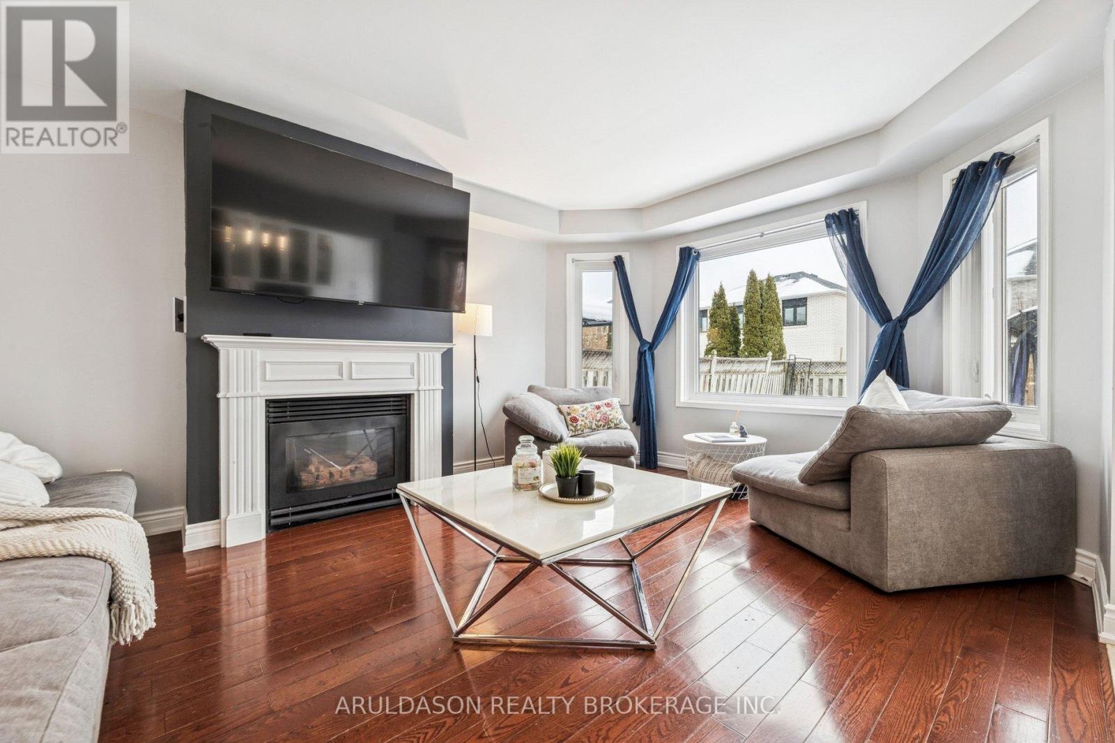 3 Booth Crescent, Ajax, ON - Indoor Photo Showing Living Room With Fireplace
