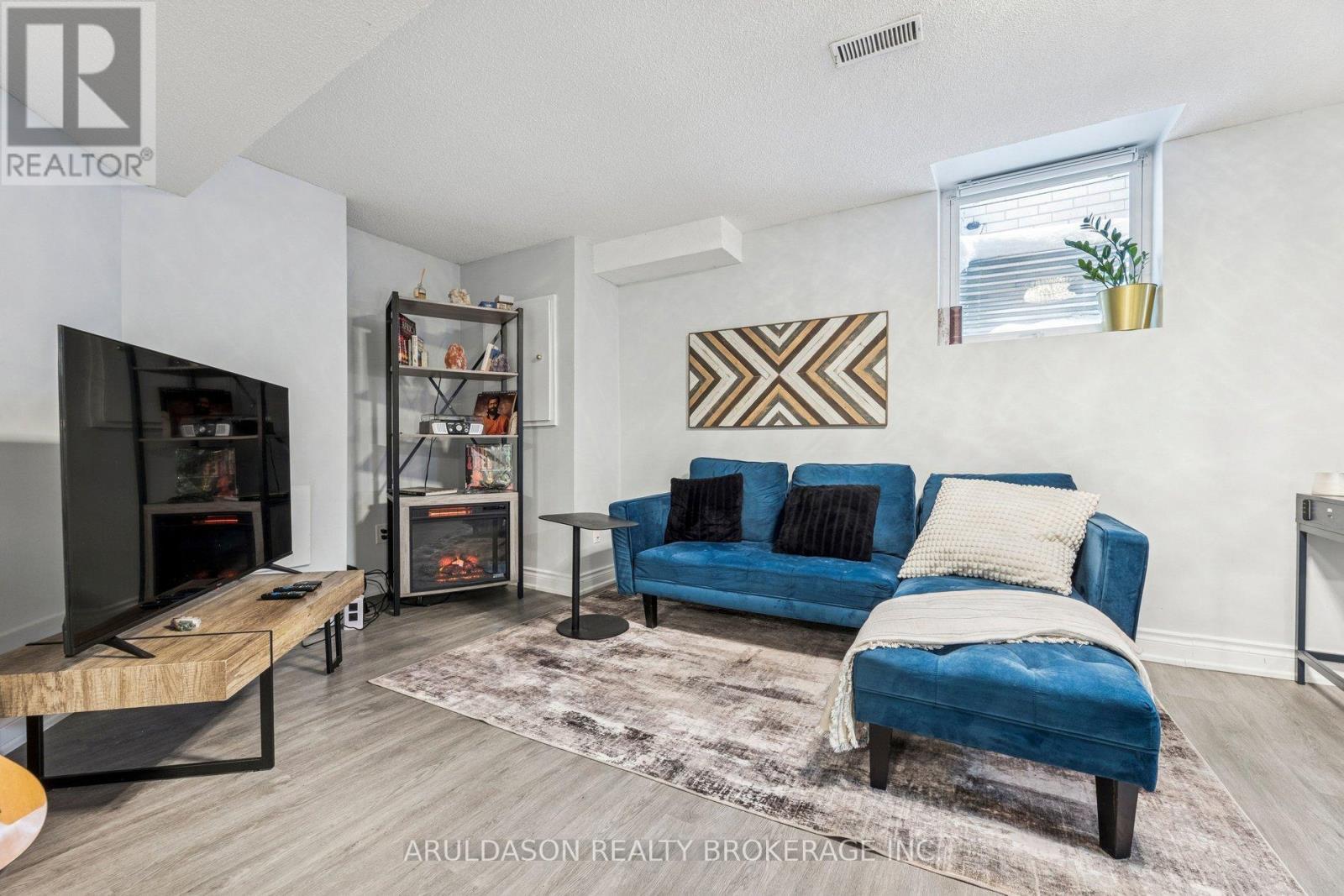 3 Booth Crescent, Ajax, ON - Indoor Photo Showing Living Room With Fireplace