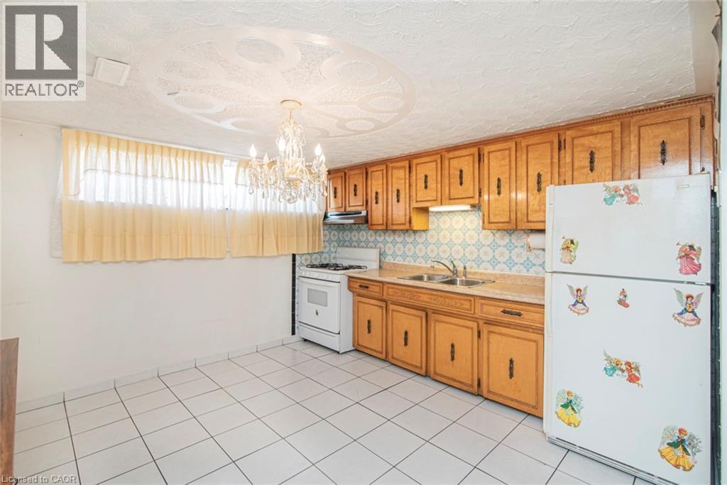 31 Adair Avenue, Hamilton, ON - Indoor Photo Showing Kitchen With Double Sink
