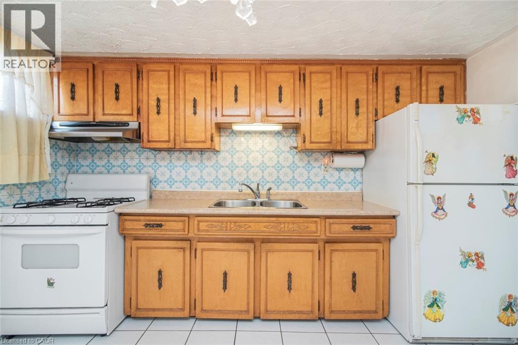 31 Adair Avenue, Hamilton, ON - Indoor Photo Showing Kitchen With Double Sink