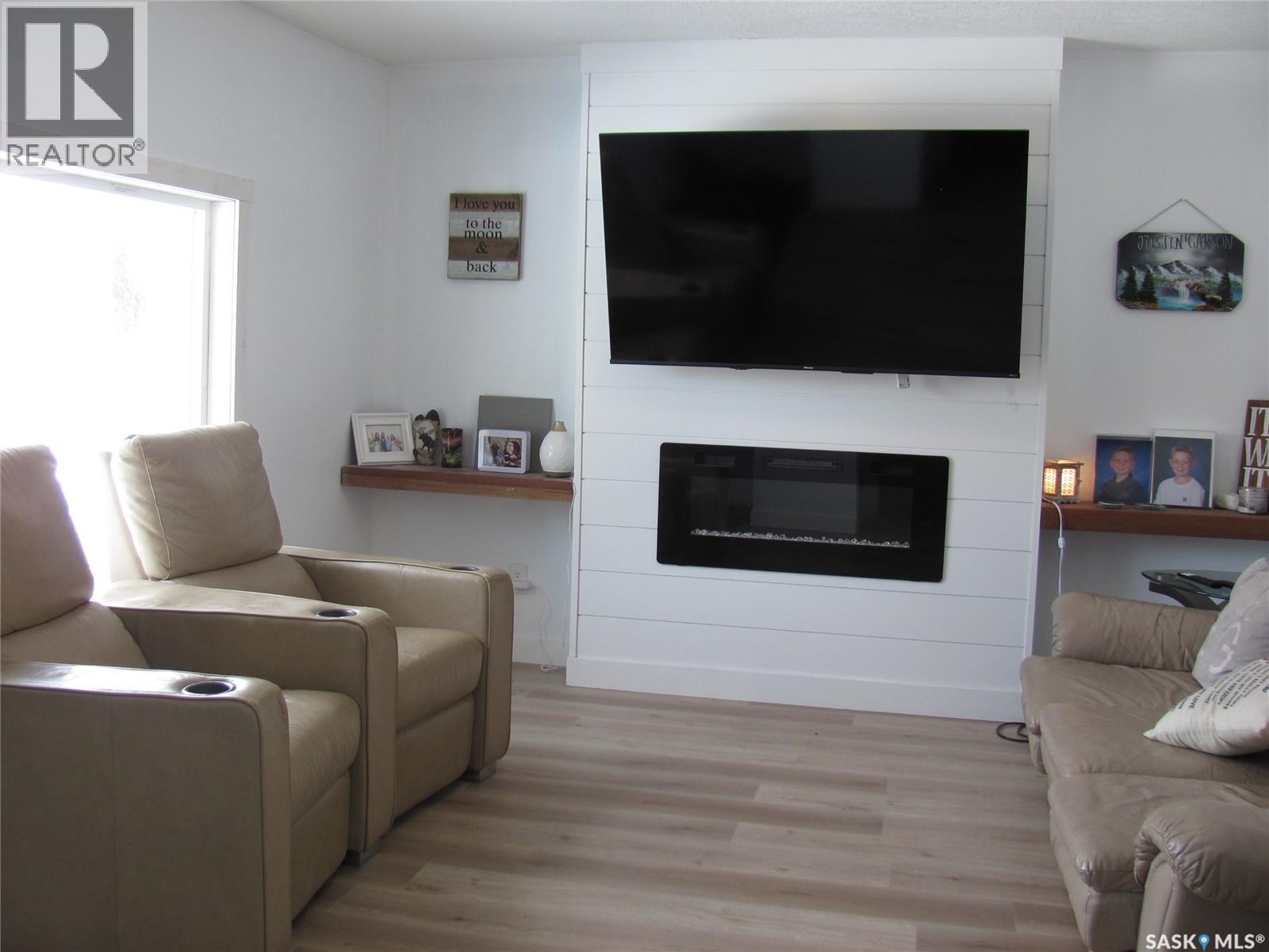 314 Main Street, Langham, SK - Indoor Photo Showing Living Room With Fireplace