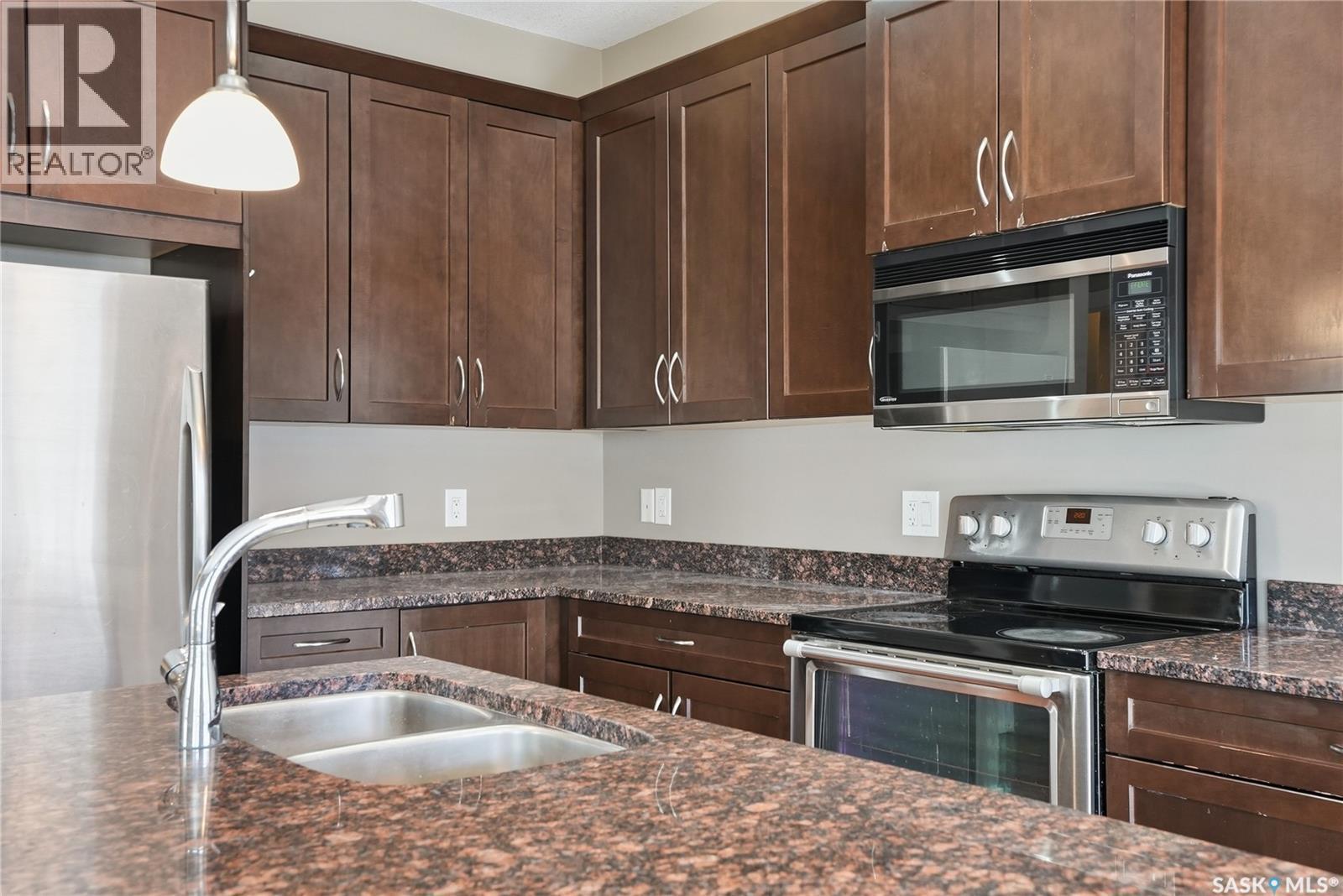 167 115 Shepherd Crescent, Saskatoon, SK - Indoor Photo Showing Kitchen With Stainless Steel Kitchen With Double Sink