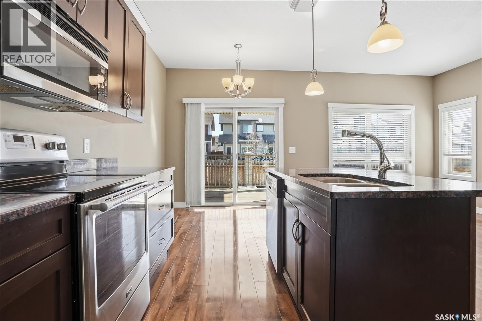 167 115 Shepherd Crescent, Saskatoon, SK - Indoor Photo Showing Kitchen With Double Sink