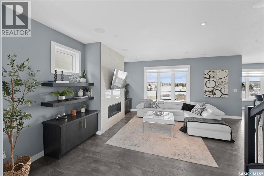 4357 Albulet Drive, Regina, SK - Indoor Photo Showing Living Room With Fireplace