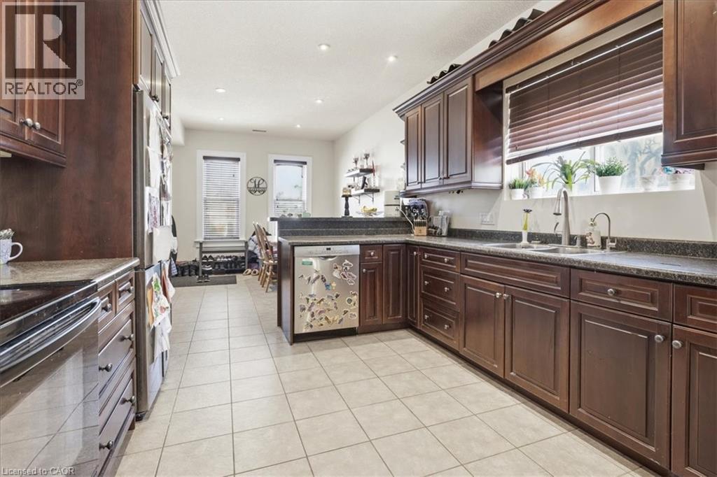 Unit 31 - large and updated kitchen - 31 Bingeman Street, Kitchener, ON - Indoor Photo Showing Kitchen With Double Sink