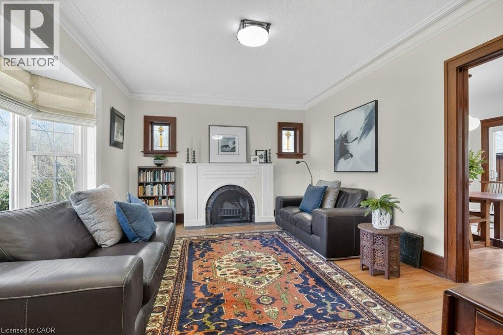 Large front living room - 859 Queen'S Boulevard, Kitchener, ON - Indoor Photo Showing Living Room With Fireplace