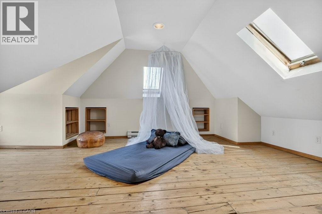 Sun-drenched loft space is perfect for a bedroom, studio, or office - 859 Queen'S Boulevard, Kitchener, ON - Indoor Photo Showing Other Room