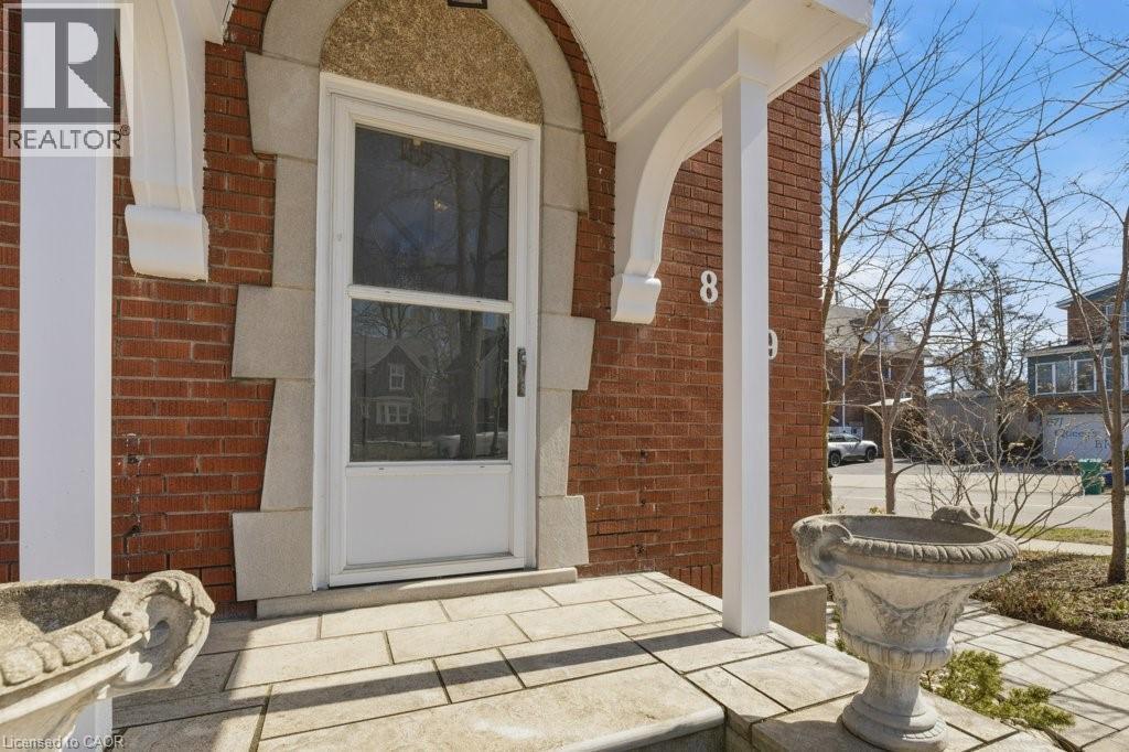 Classic front door with stylish walkway - 859 Queen'S Boulevard, Kitchener, ON - Outdoor With Deck Patio Veranda With Exterior