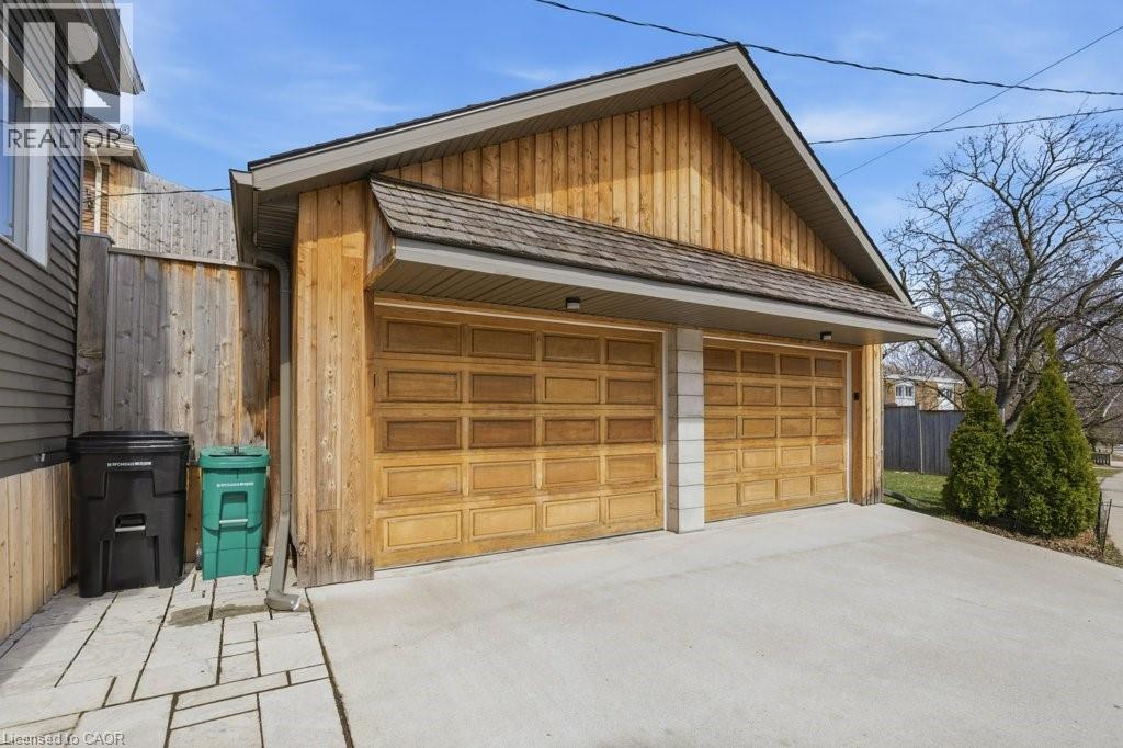 Large double car garage built in 2020 - 859 Queen'S Boulevard, Kitchener, ON - Outdoor With Exterior