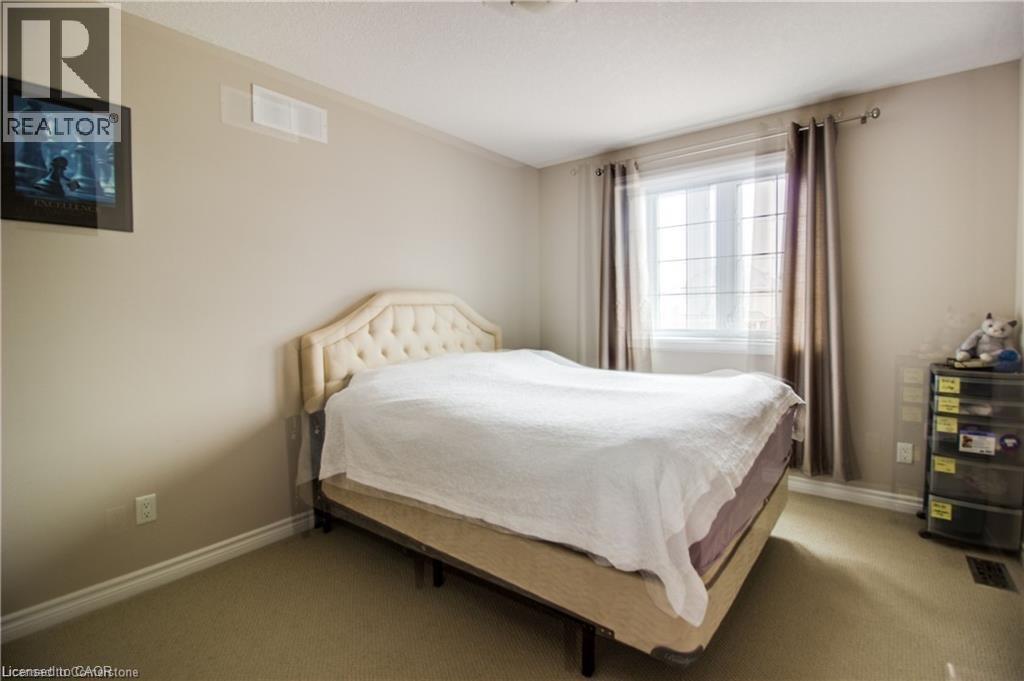 Bedroom with carpet flooring - 101 Robert Simone Way, Ayr, ON - Indoor Photo Showing Bedroom