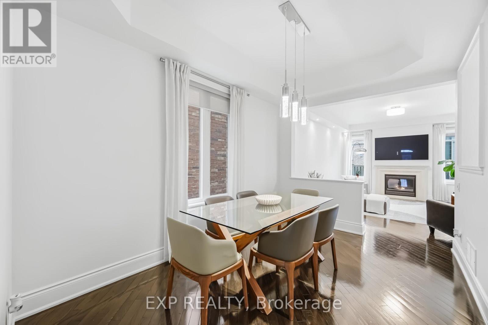 70 Torah Gate, Vaughan, ON - Indoor Photo Showing Dining Room With Fireplace