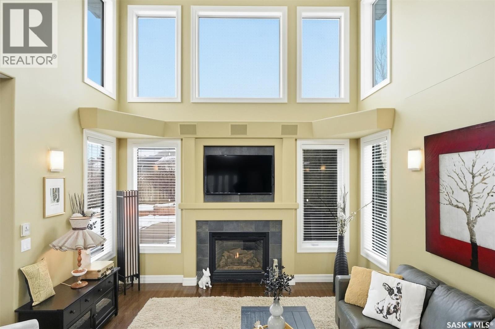302 Brookhurst Terrace, Saskatoon, SK - Indoor Photo Showing Living Room With Fireplace