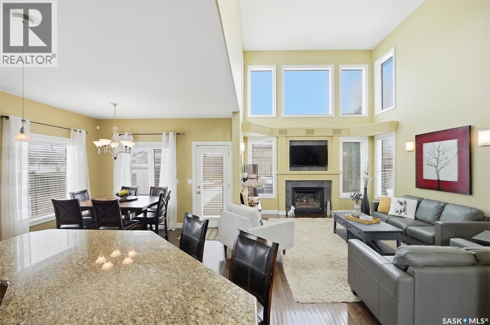 302 Brookhurst Terrace, Saskatoon, SK - Indoor Photo Showing Other Room With Fireplace