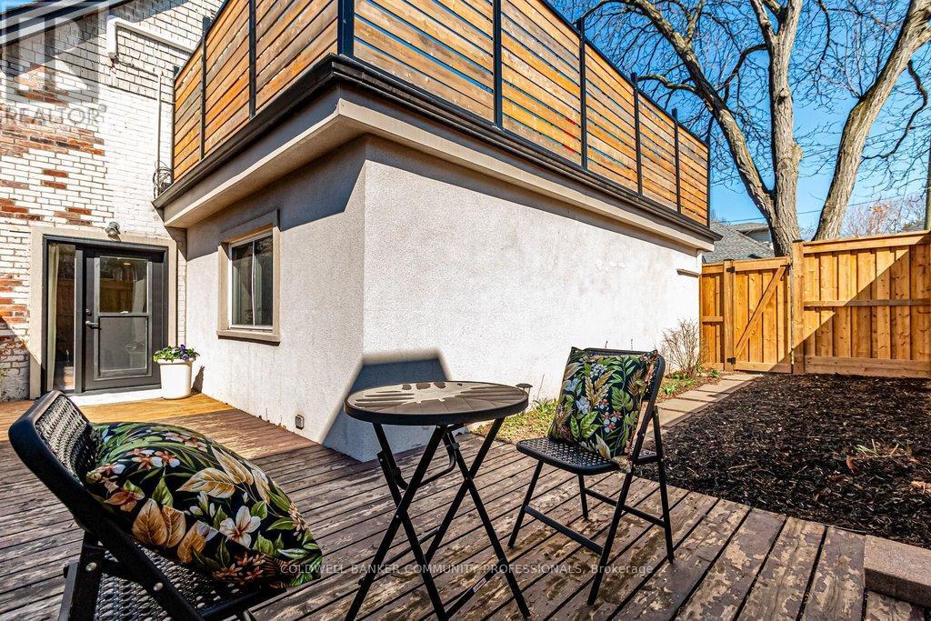 Lower deck with side yard and gate access to front - 14 Reginald Street, Hamilton, ON - Outdoor With Deck Patio Veranda