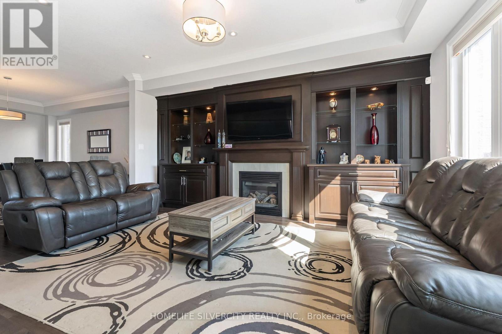 153 Medici Lane, Hamilton, ON - Indoor Photo Showing Living Room With Fireplace