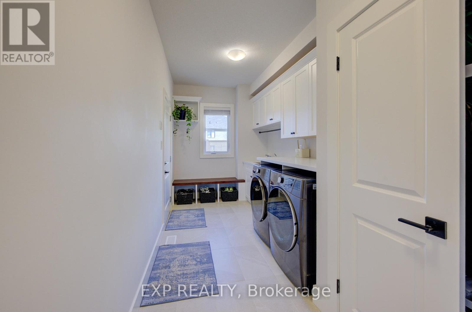58 Carriage Crossing, Mapleton, ON - Indoor Photo Showing Laundry Room