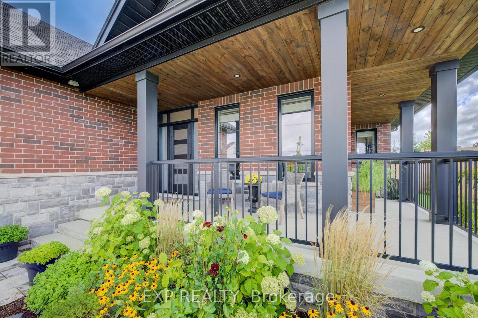 58 Carriage Crossing, Mapleton, ON - Outdoor With Deck Patio Veranda With Exterior