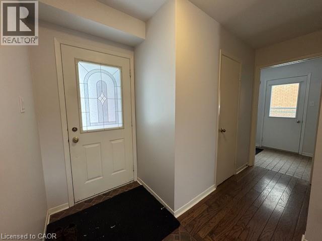 Foyer with dark wood-type flooring and healthy amount of natural light - 536 Thorndale Drive, Waterloo, ON - Indoor Photo Showing Other Room