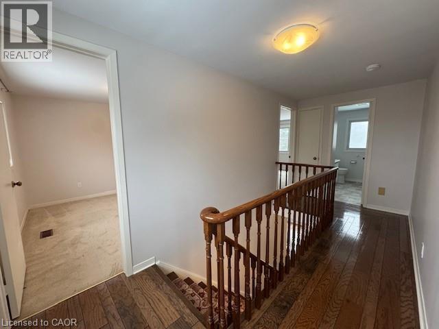 Hall featuring an upstairs landing and dark wood-type flooring - 536 Thorndale Drive, Waterloo, ON - Indoor Photo Showing Other Room
