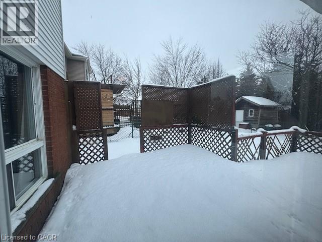 View of snow covered deck - 536 Thorndale Drive, Waterloo, ON - Outdoor With Deck Patio Veranda With Exterior