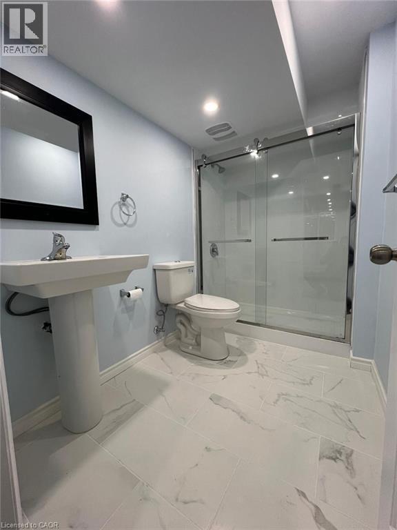 Bathroom featuring a shower stall and light marble finish flooring - 167 Histand Trail Unit# Lower, Kitchener, ON - Indoor Photo Showing Bathroom