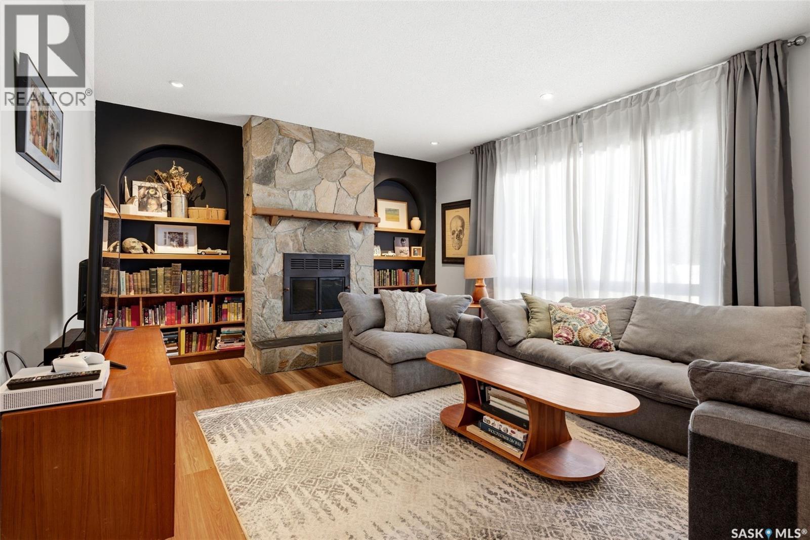 89 Patterson Drive, Regina, SK - Indoor Photo Showing Living Room With Fireplace
