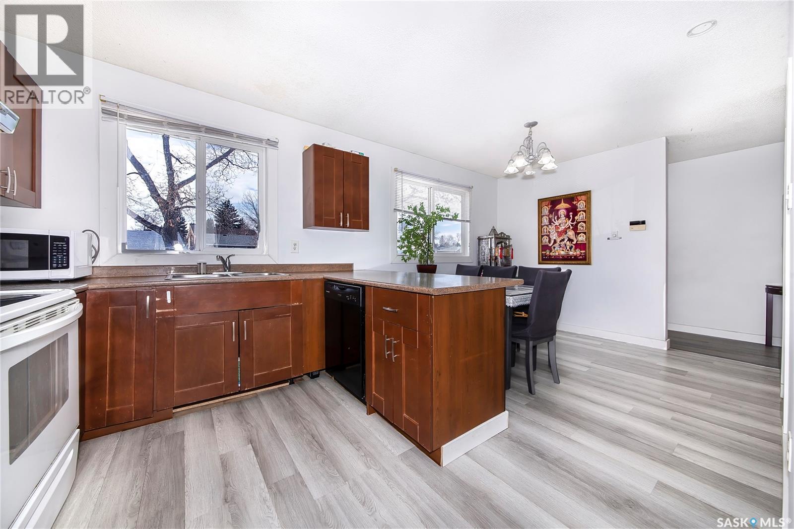 639 Redberry Road, Saskatoon, SK - Indoor Photo Showing Kitchen With Double Sink