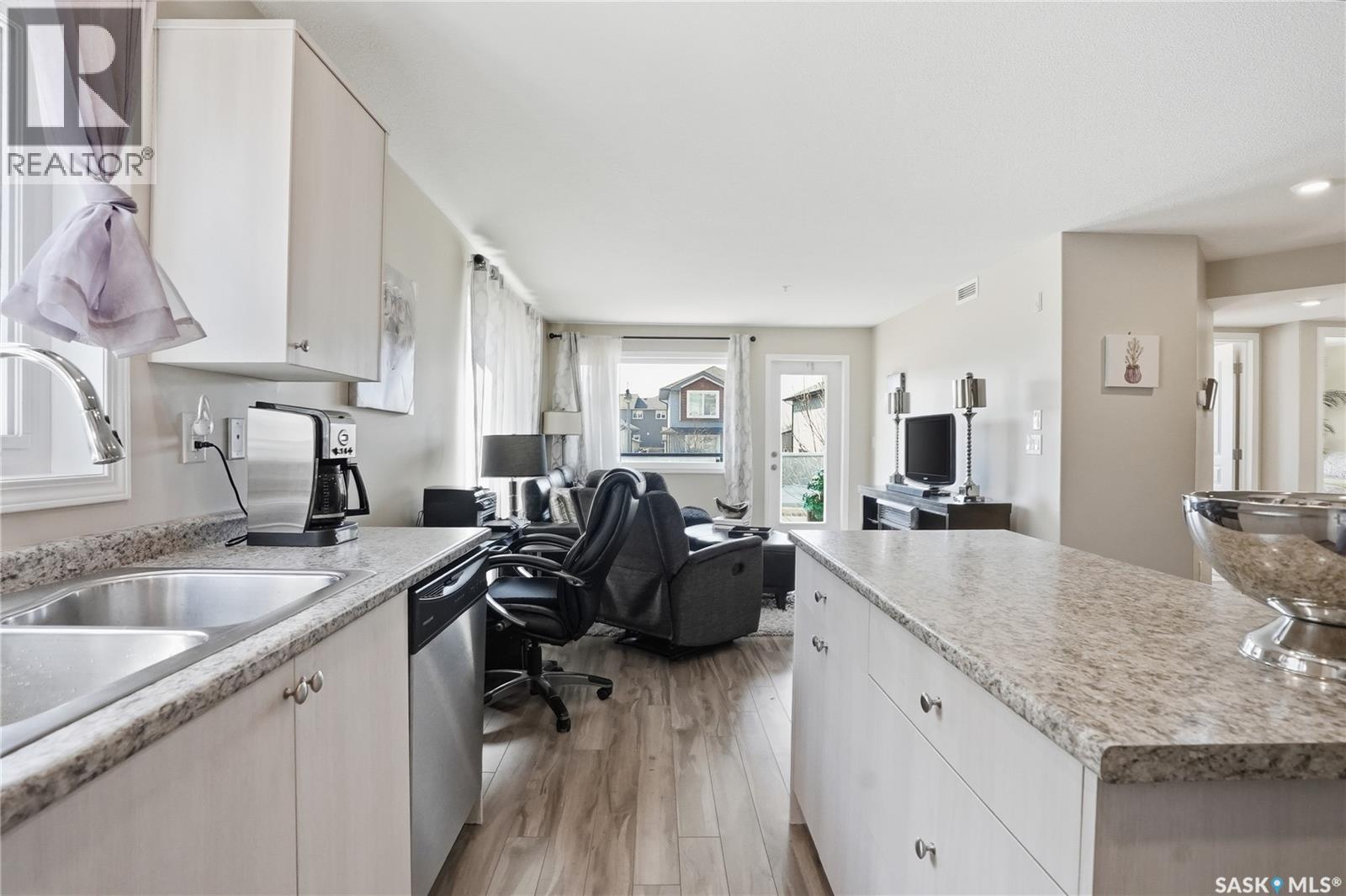 1105 102 Willis Crescent, Saskatoon, SK - Indoor Photo Showing Kitchen With Double Sink
