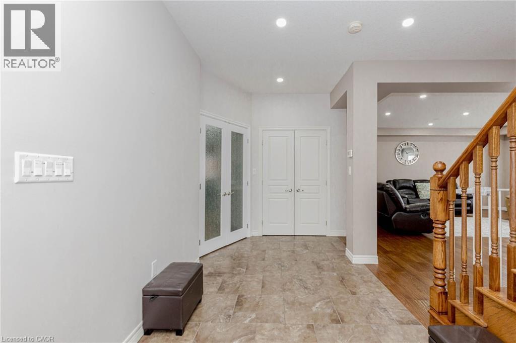 Corridor featuring french doors and recessed lighting - 2 Doon Creek Street, Kitchener, ON - Indoor Photo Showing Other Room