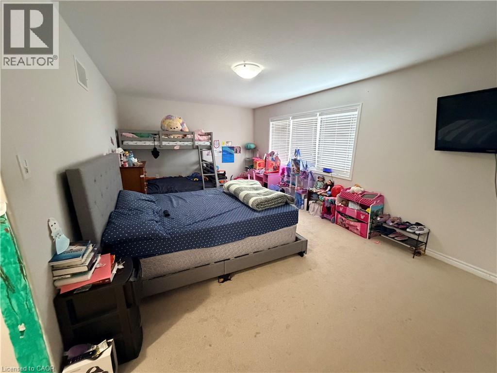Bedroom with carpet and baseboards - 31 Sofitel Drive, Kitchener, ON - Indoor Photo Showing Bedroom