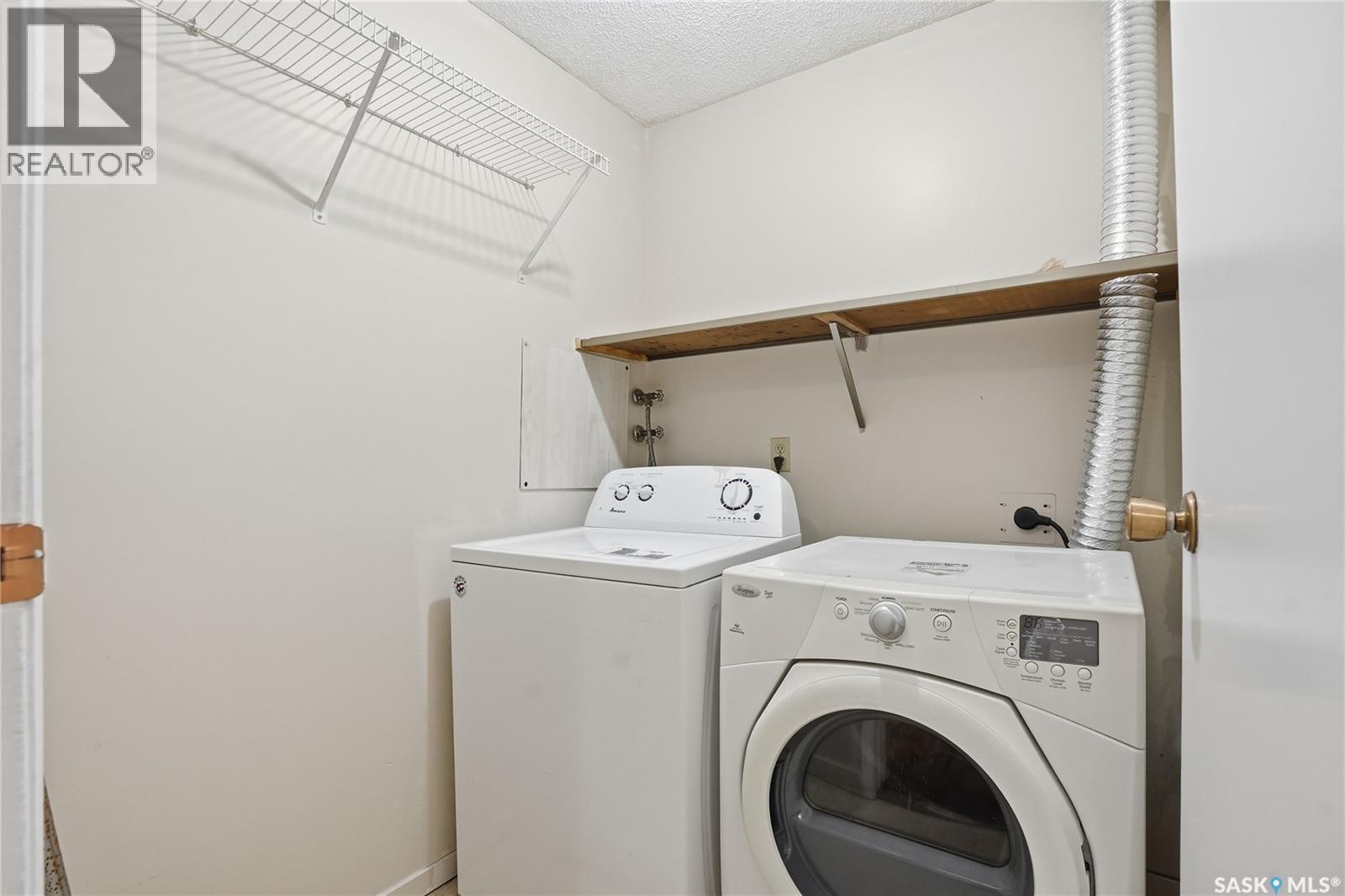 203 311 Tait Crescent, Saskatoon, SK - Indoor Photo Showing Laundry Room