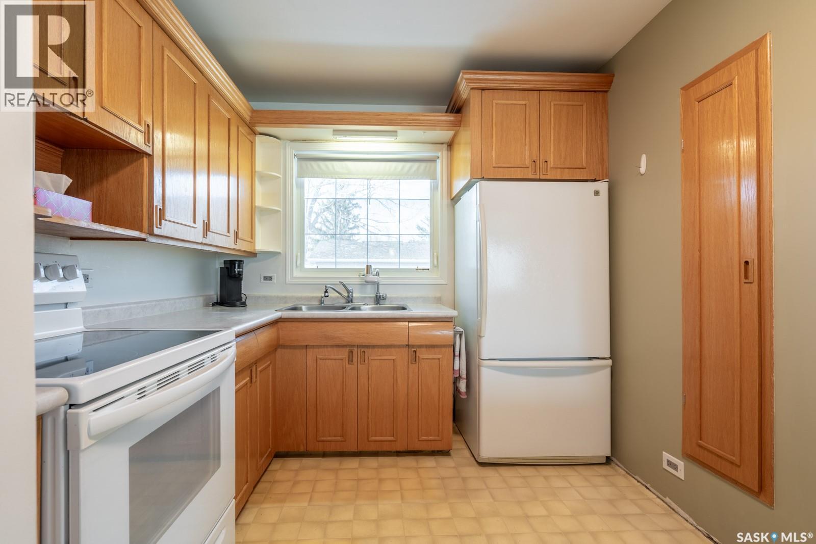 5308 2Nd Avenue, Regina, SK - Indoor Photo Showing Kitchen With Double Sink