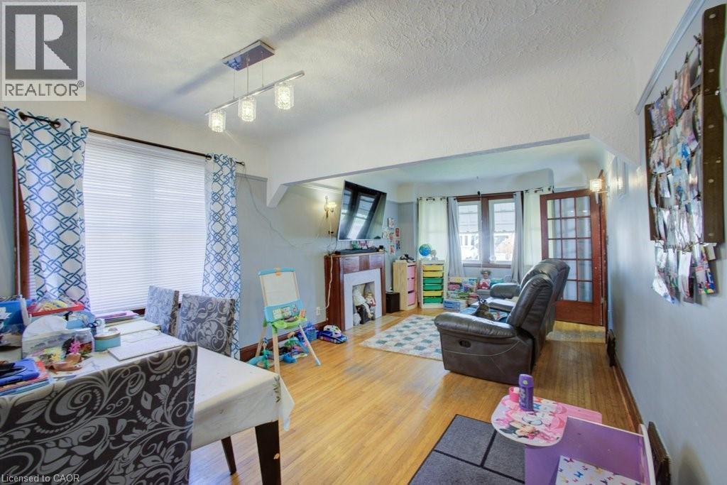 34 Barons Avenue S, Hamilton, ON - Indoor Photo Showing Living Room With Fireplace