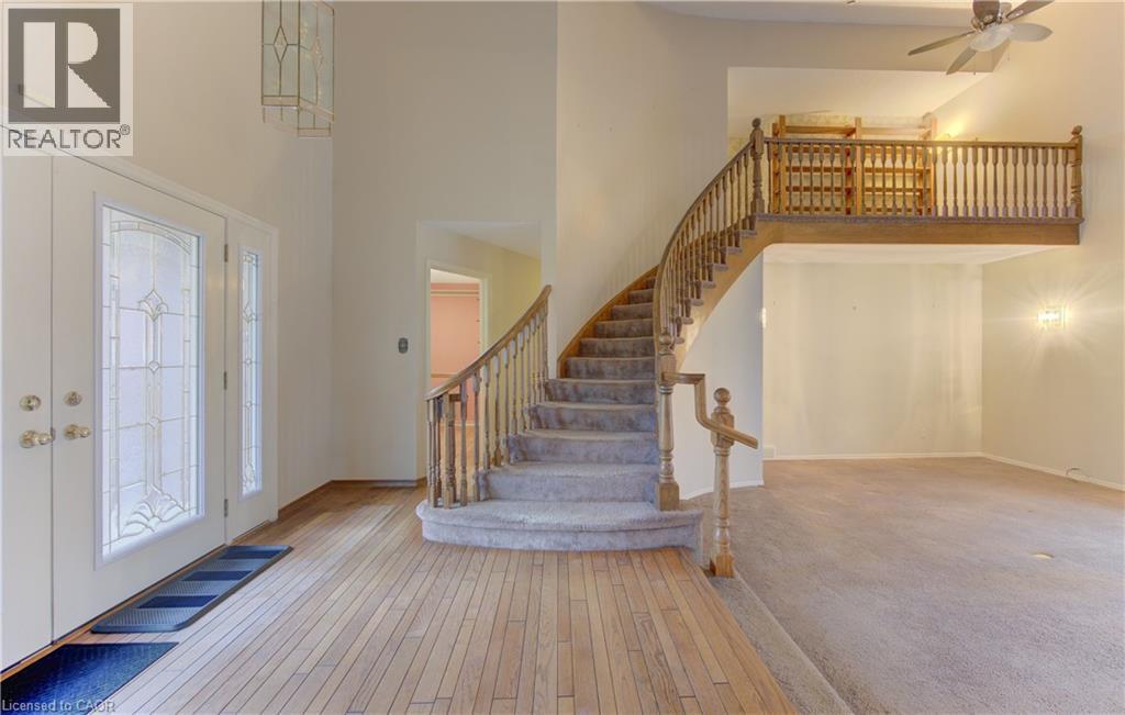 Entrance foyer featuring a high ceiling, light wood-style flooring, and a ceiling fan - 190 Silvercrest Drive, Waterloo, ON - Indoor Photo Showing Other Room