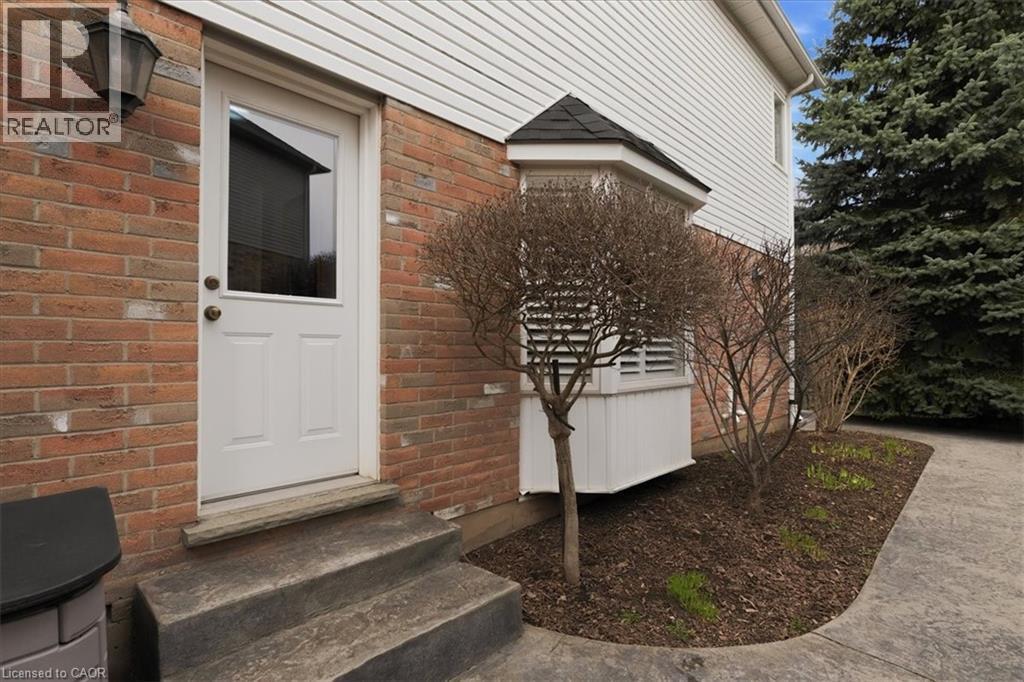 Entrance to property with brick siding - 54 Woodcrest Court, Kitchener, ON - Outdoor With Exterior