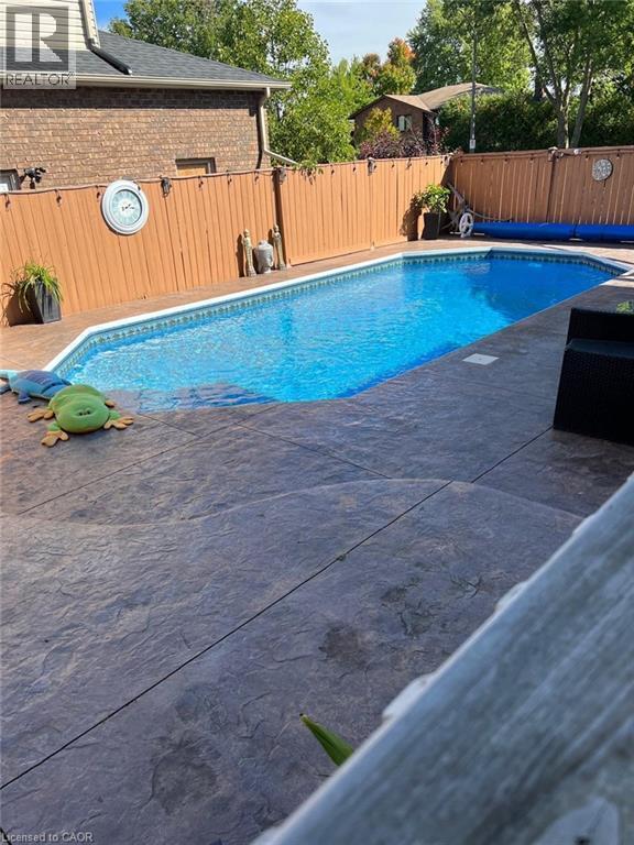 picture from summer time - 122 Grand River Boulevard, Kitchener, ON - Outdoor With In Ground Pool