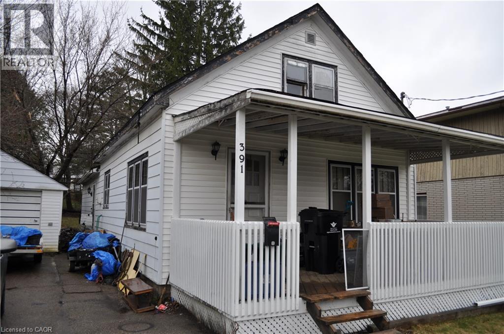 1.5 storey home featuring covered porch - 391 Lawrence Avenue, Kitchener, ON - Outdoor With Deck Patio Veranda With Exterior