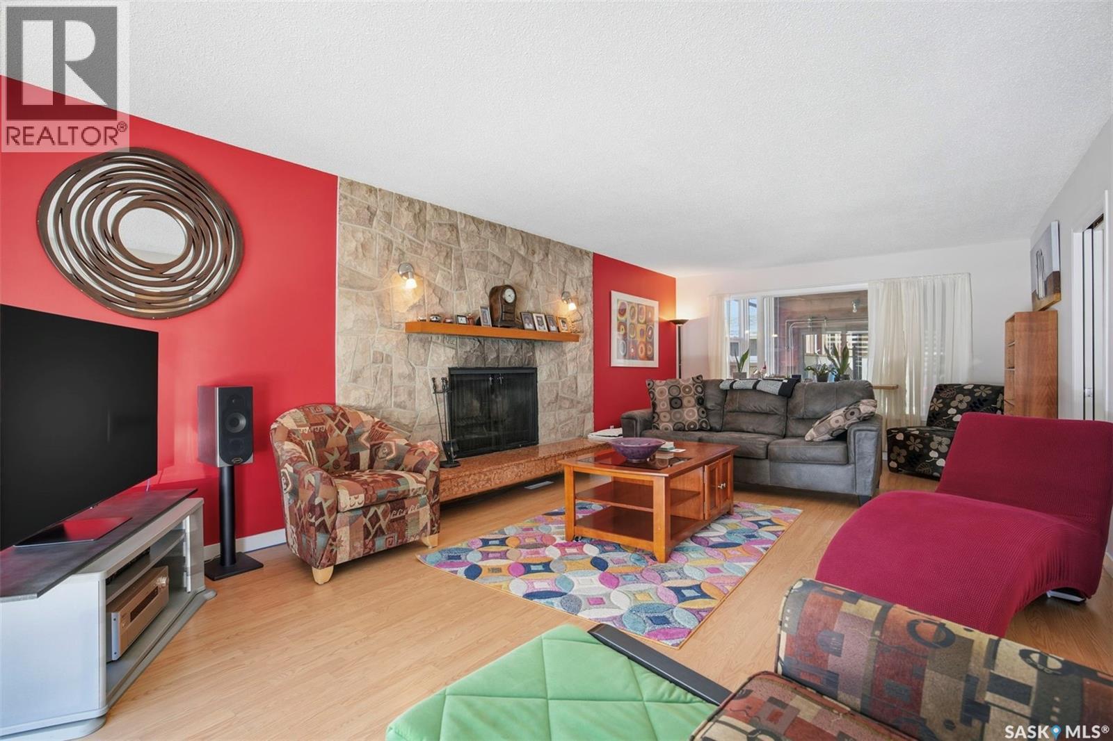 31 Cantlon Crescent, Saskatoon, SK - Indoor Photo Showing Living Room With Fireplace