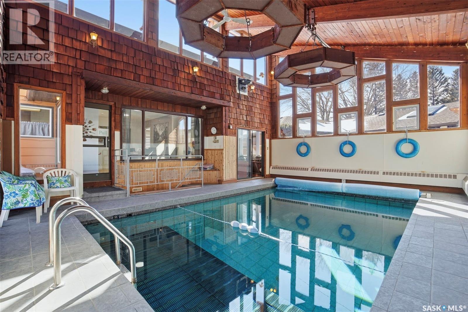 31 Cantlon Crescent, Saskatoon, SK - Indoor Photo Showing Other Room With In Ground Pool