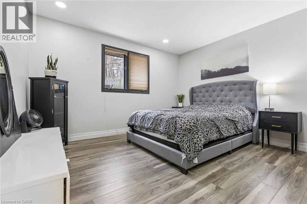 Bedroom featuring light wood finished floors and recessed lighting - 3 Chicopee Terrace, Kitchener, ON - Indoor Photo Showing Bedroom